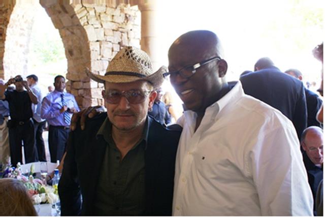 Seane with U2 singer Bono at Archbishop Desmond Tutu’s 80th Birthday celebration in Cape Town, South Africa. Seane said Bono is one of his favorite people in the world.