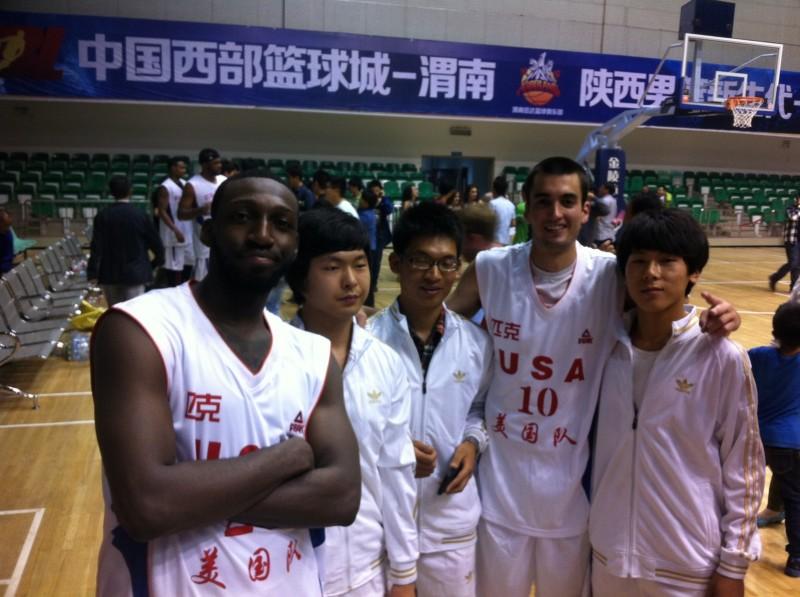 Parker Smith poses with fans during a stop on the China Hoops Tour. Photo courtesy of Parker Smith