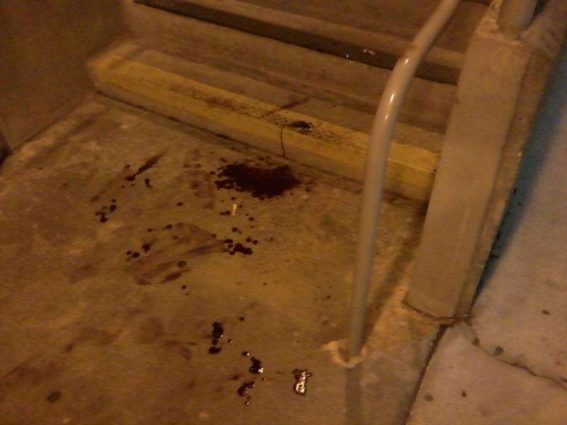 Gillette also tracked blood on the stairs of Building 14d. Photo by Brandon Thigpen