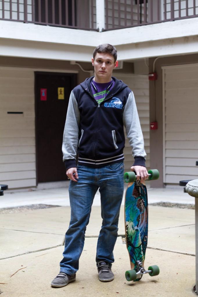 Will Gualtieri with his once stolen skateboard at the UNF Fountains. Photo by Randy Rataj. 