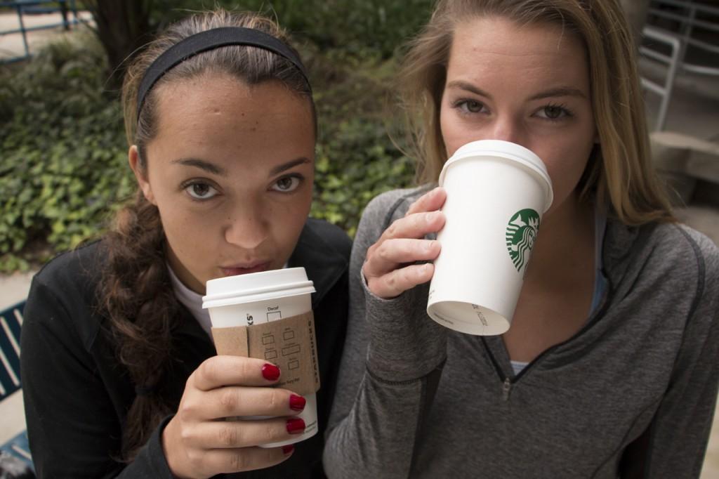 Ebony Gunn, athletic training major, and Cameron McGuire, public relations major, get their caffeine fix before their afternoon volleyball practice. Photo by Bronwyn Knight. 