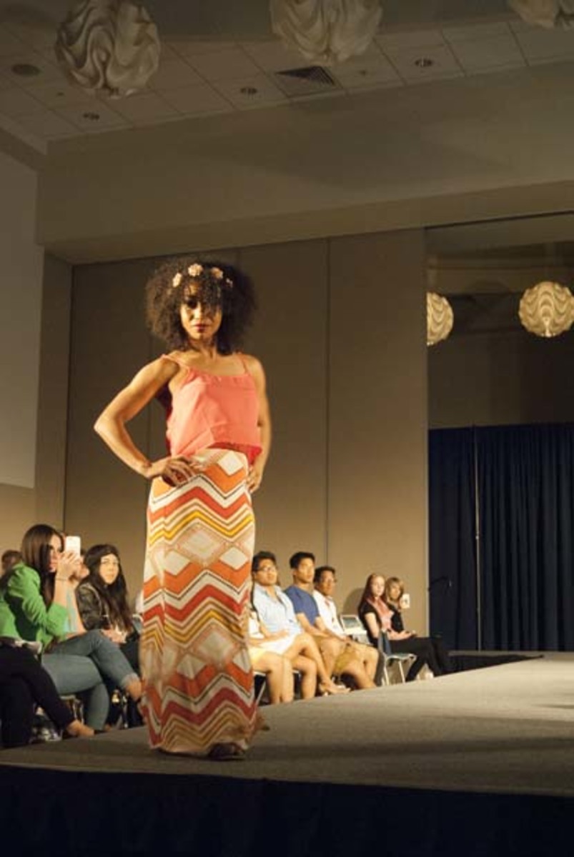Yasha Albright, health administration senior, poses at the end of the runway. Photo by Camille Shaw