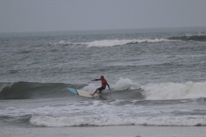 UNF Surf Team member Patrick Nichols rides the waves. Photo courtesy of Adam Bartoshesky.