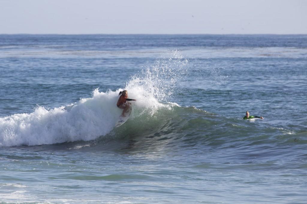 NSSA National Women's Champion, freshman Emily Ruppert on one of the two wave that won her the title! Making a solid turn in the pocket! Photo by Randy Rataj