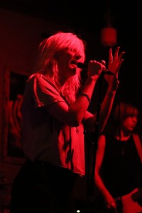Mish Way , of White Lung, rocks out on stage during her band's set. Photo by Michaela Gugliotta  