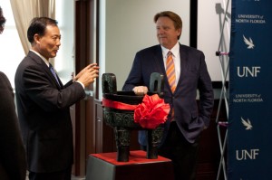 Zhang gave Delaney a gift of a Chinese Ding, a replica of the ceremonial cauldron from the Zhou dynasty. Photo by Joshua Brangenberg