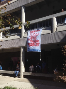 A banner signed by "Students Gov." was seen hanging outside of Bldg. 3. misrepresenting Student Government. Photo by Cody Quattlebaum