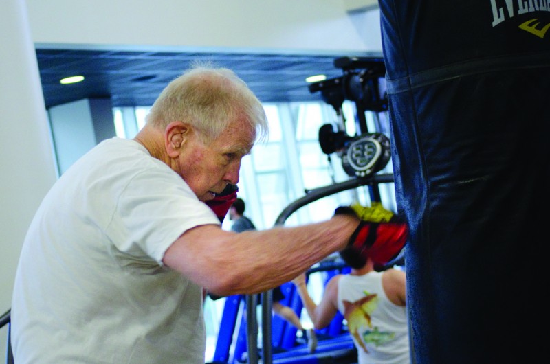 Ken Comyns delivers blows to the punching bag in the UNF Student Wellness Complex.  Photo by Ali Blumenthal