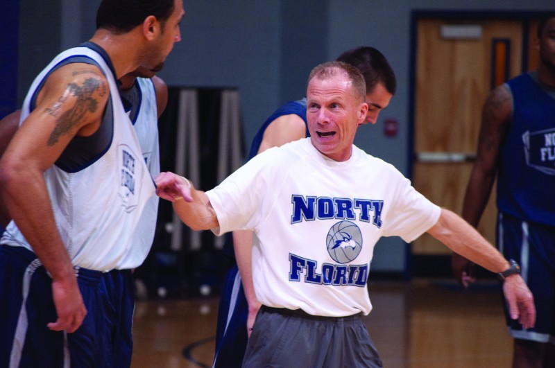 Photo Credit: Sean Patterson Driscoll directs senior Andy Diaz at practice.