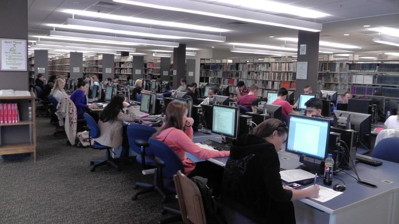 Students at the library computers. Photo from video by Natalie Logan