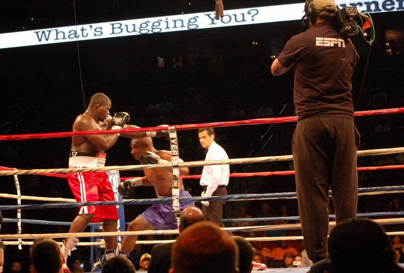 ESPNs "Friday Night Fights" event at Jacksonville Memorial Arena. Bout between Jacksonvilles Curtis Harper [red] and Donovan Dennis [blue]. Photo Credit: Travis Gibson