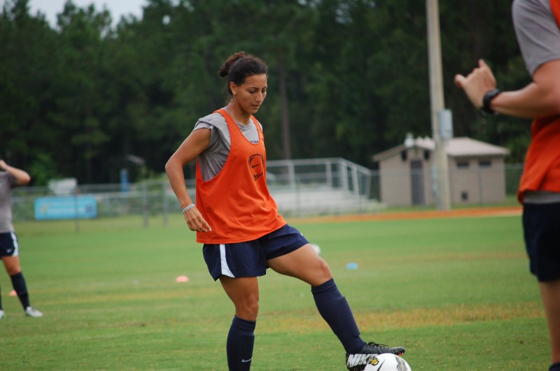 Senior forward Carolina Lencina, who led the team with 25 shots on goal last season, warms up during pre-season practice. Photo credit: Travis Gibson