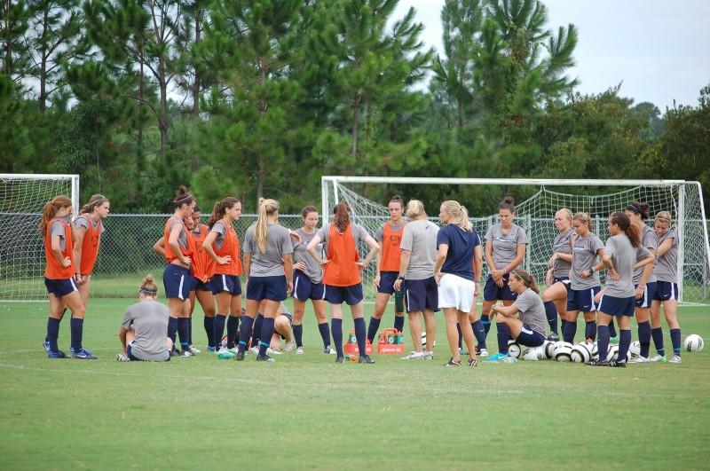 Coach Linda Hamilton talks to the team during a pre-season practice. Photo credit: Andrew Nichols