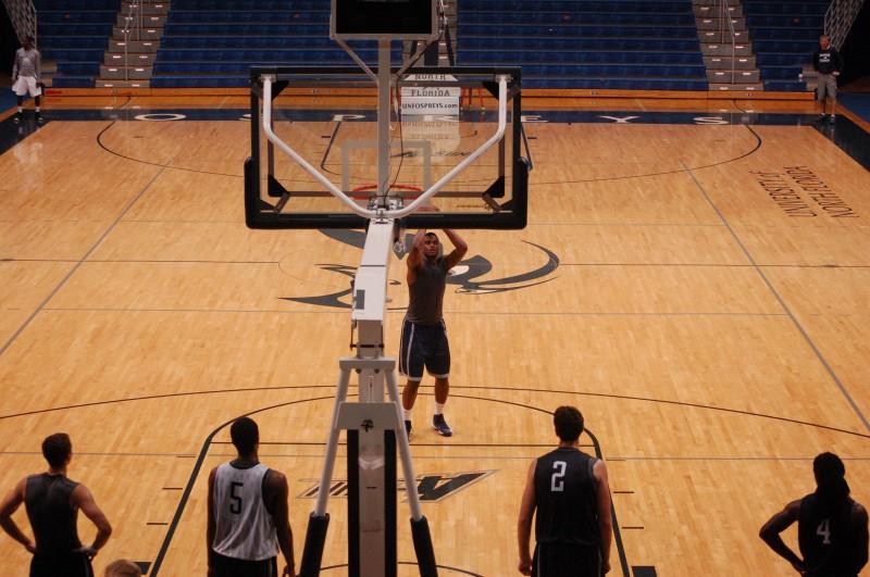 Senior and leading scorer last season Travis Wallace puts in work at the free-throw line. 