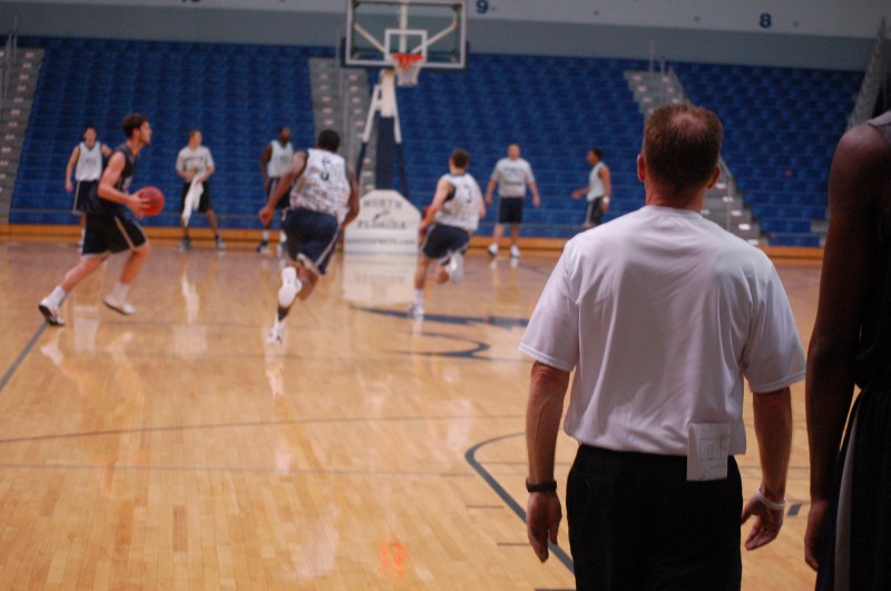 Head coach Matthew Driscoll looks over his team as they run drills (Photo: Travis Gibson)