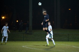 Casey Caronis elevates for a header against JU Wednesday night. Photo credit: John Shippee