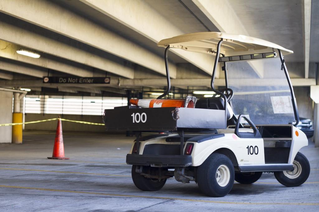 Parking Services Golf Cart 100 made use of the blocked off parking spots. Photo by Randy Rataj