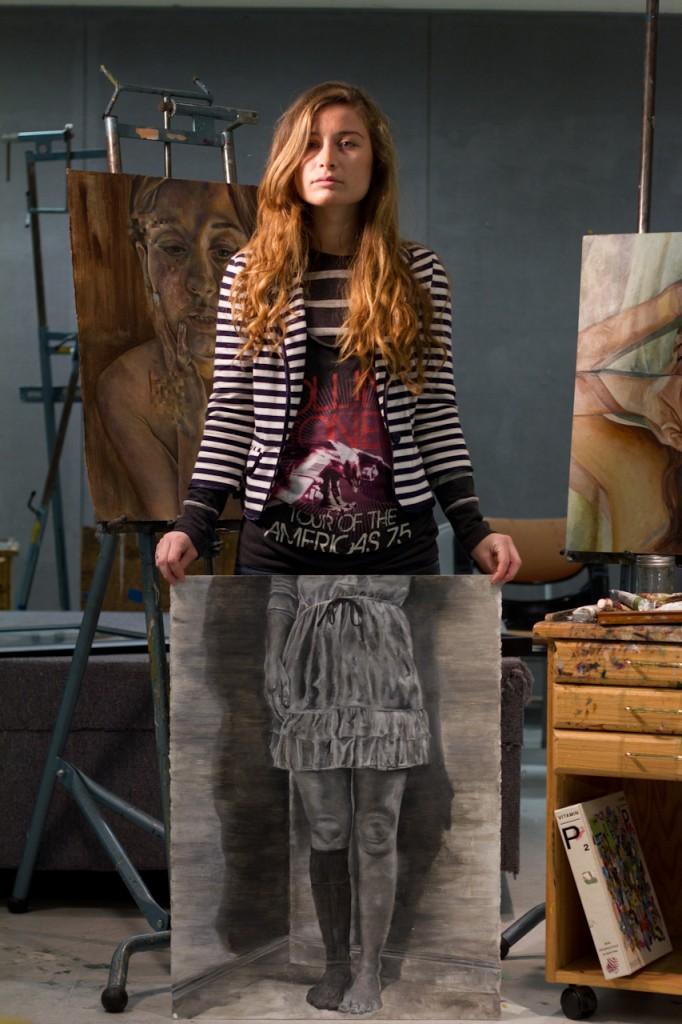 Jordyn Rector replaces her actual legs with a drawing of her legs she created Photo by Randy Rataj