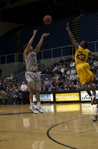 Travis Wallas takes a jump shot over a Northern Kentucky defender in the 67-66 win. Photo Credit: Mike Wilke.