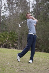 Padova holds his position after hitting the ball. Photo by Camille Shaw.