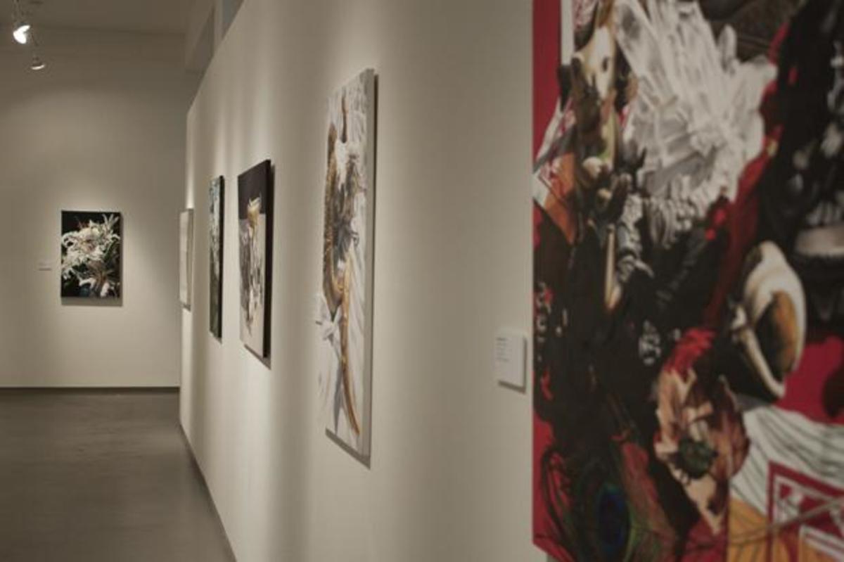 The gallery contains over a dozen paintings by Leigh Murphy. Photo by Joshua Brangenberg