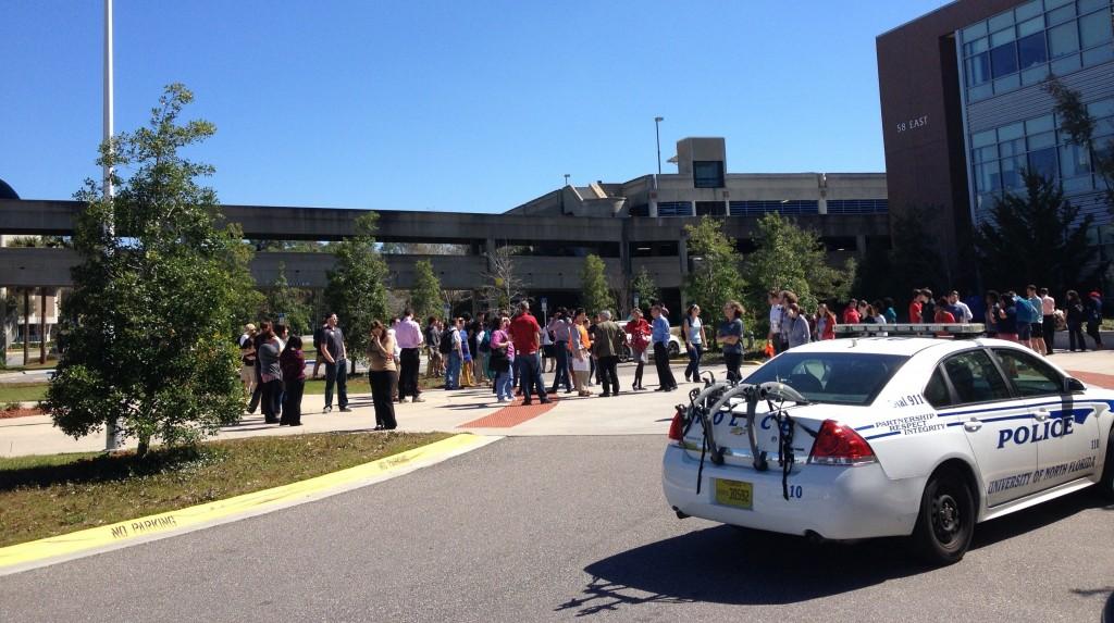Students stood outside as fire alarms blared for 20 minutes. Photo by Lydia Moneir