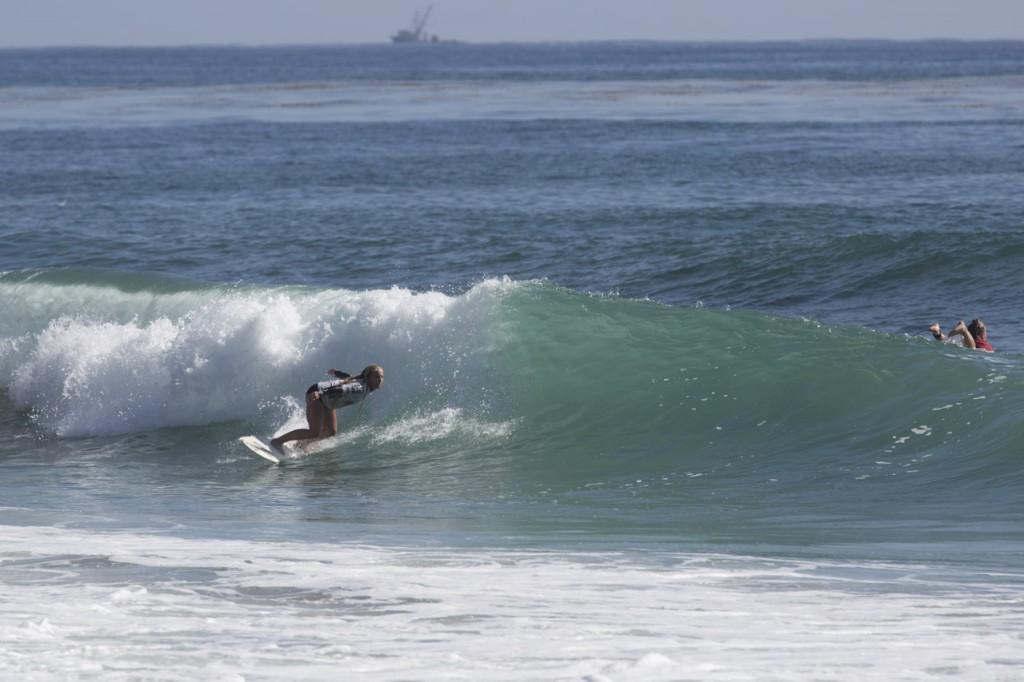 Frehsman Emily Ruppert setting up for a big turn with a big bottom turn! Photo by Randy Rataj