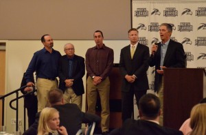 The 1990 men’s tennis team and coach Charlie Jenks accept their induction into the Hall of Fame. Photo by Lacey Wyndham