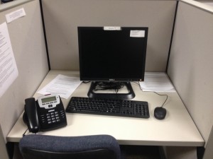 Students conducting the survey sit at these cubicles for four-hour sessions and call randomly generated numbers. Photo by Lydia Moneir