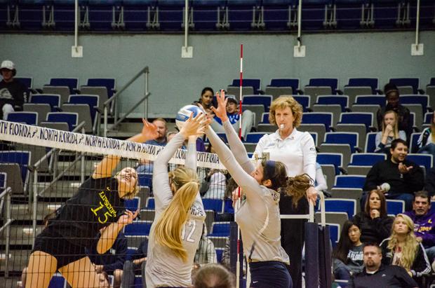 Van Alstine (12) and Carina Hoff (1) play in the close match against Lipscomb on Nov. 7. Photo by Robert Curtis