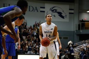 UNF's starting guard, Dallas Moore (14), had 27 points on the night.  Photo by Camille Shaw