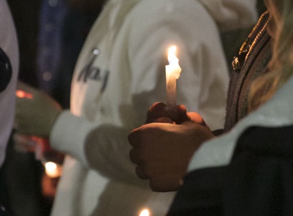 Candle light vigil held for Chapel Hill victims at UNF Peace Plaza
