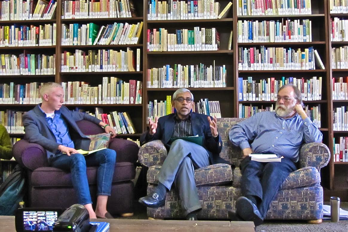 From left to right: Charles Hack, Dr. Parvez Ahmed and Dr. David Shwam-Baird lead the discussion.Photo by Tarah Trueblood