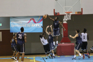 Demarcus Daniels swats a shot with an assertive block. Photo courtesy of 10th Year Seniors