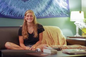 Coastal biology junior Meg Simon is a resident at the new Frassati Newman faith-based housing apartments. Simon is also the Service Coordinator for the Catholic Osprey club on campus. Photo by Rachel Cazares