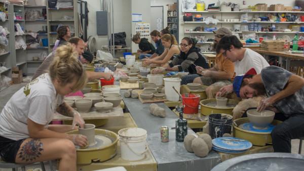 Students, alongside professors, create these works to help with fundraising at the 31st Annual Empty Bowls Luncheon. Photo by Michael Herrera