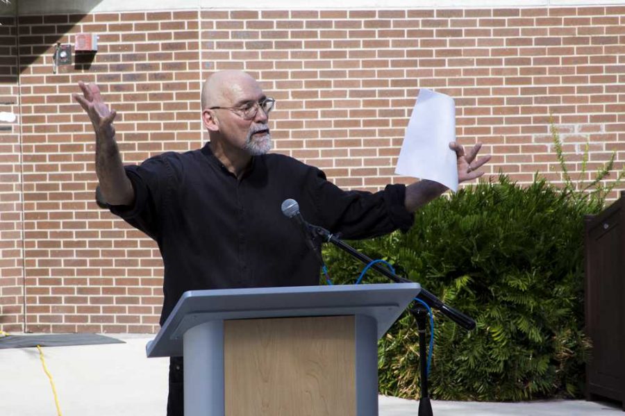 Dr. Jason Mauro speaking at the UNF Peace Plaza when he dedicated the Thoreau Table in Nov. 2015. The table is named after the 19th century writer Henry David Thoreau, author of the essay, "Civil Disobedience." Thoreau's peaceful, nonconformist principles inspired Mahatma Gandhi and Martin Luther King. 