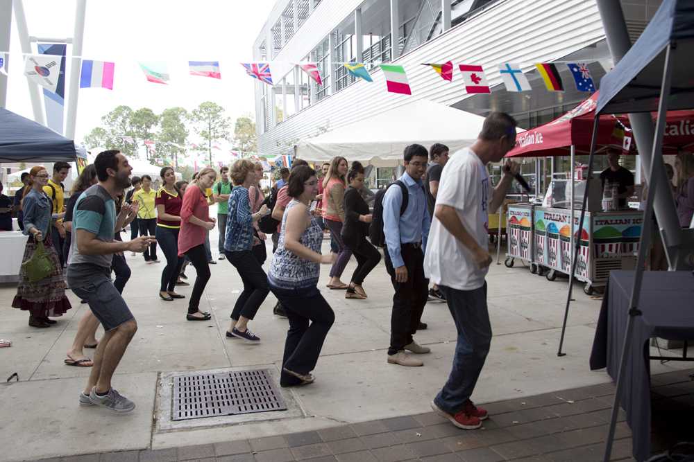 The DJ led a couple students and teachers in the “Cha Cha Slide.” Photo by Kimberly Appleby