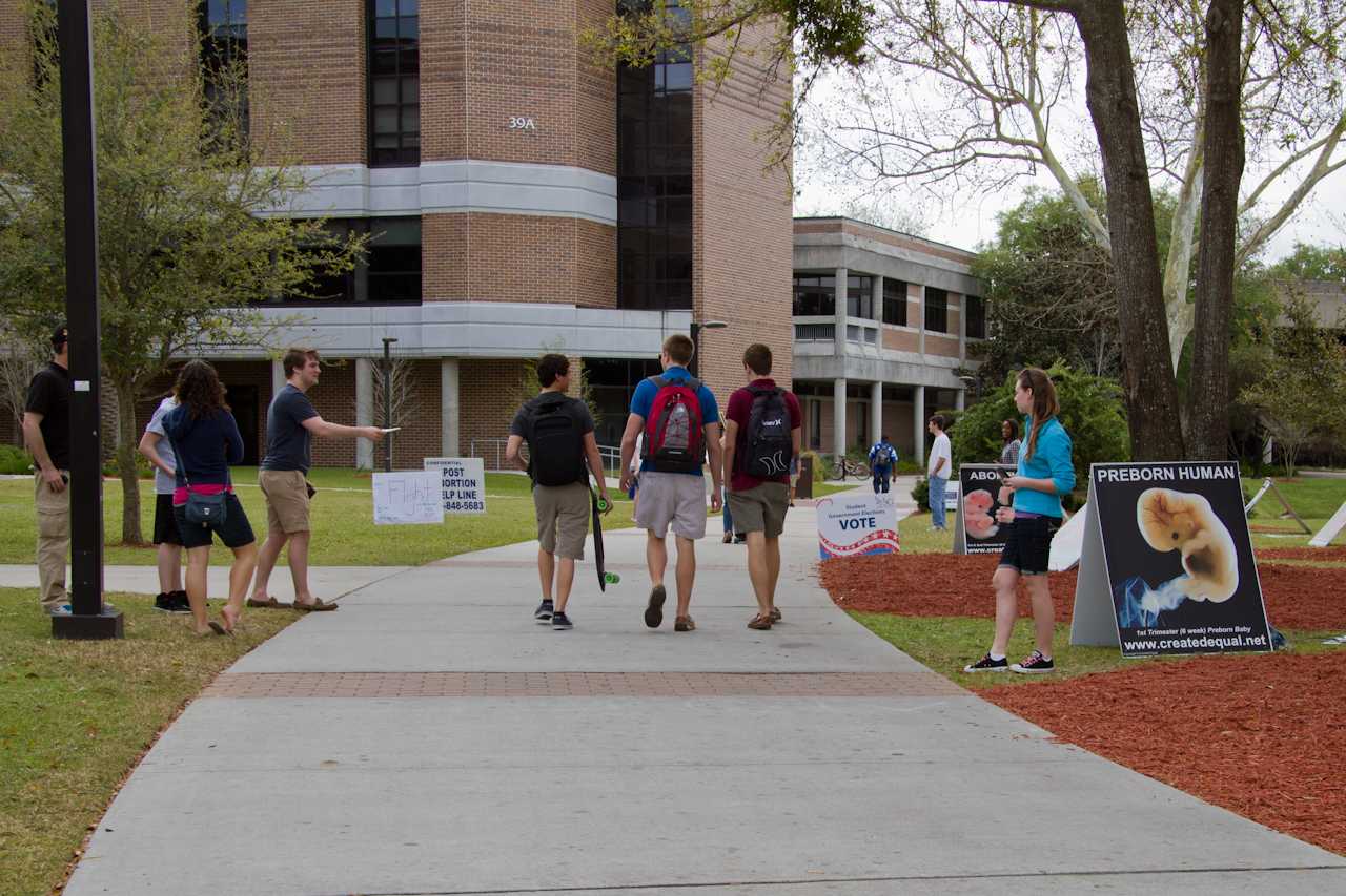 The group handing out flyers to passing students last year. Photo by Spinnaker Media 