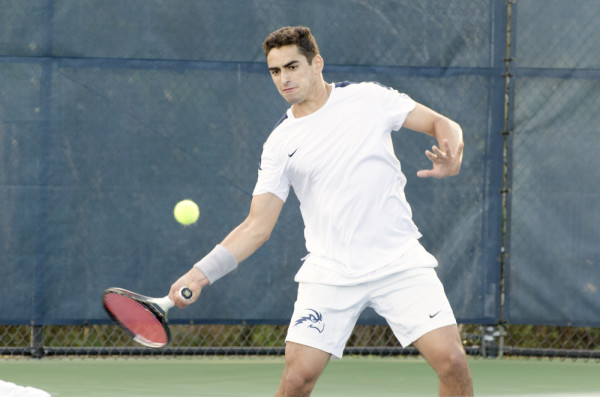 Men's tennis battled the weather to win one of two games this weekend Photo by Ashley Saldana