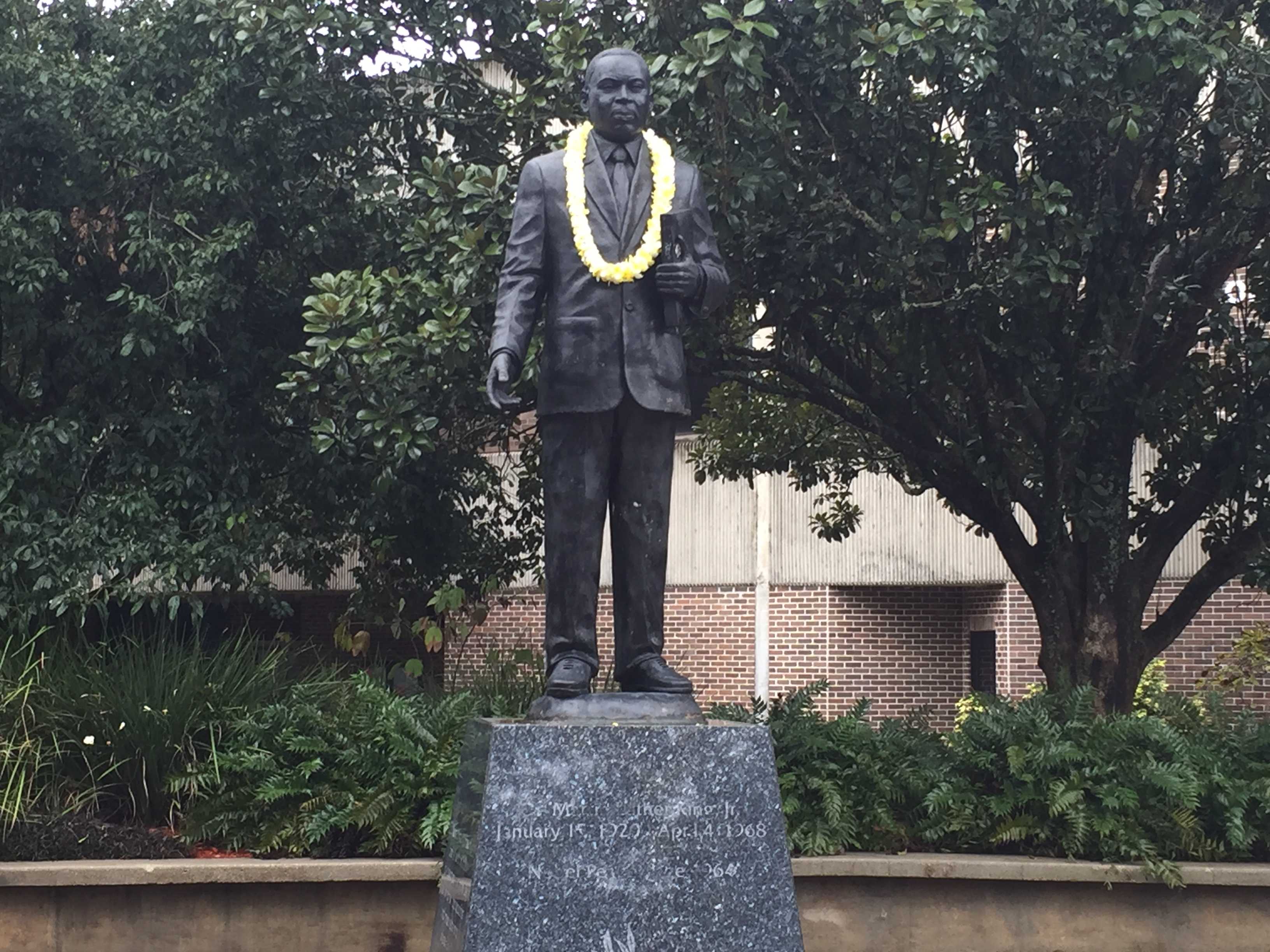 To close out the celebration, a lei was garlanded onto the statue of Martin Luther King Jr. in UNF's Peace Plaza.  Photo by Jordan Perez