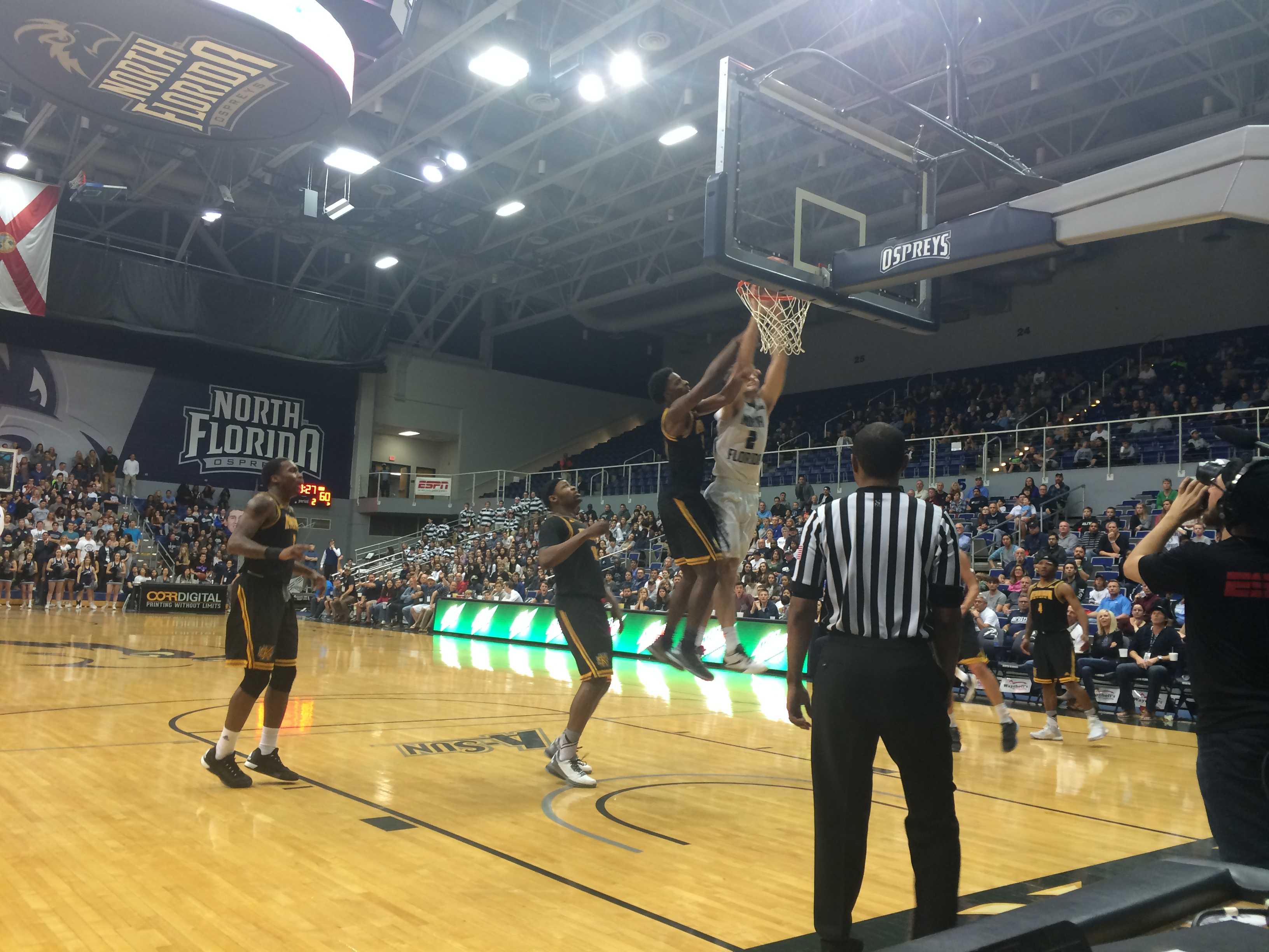 Beau Beech (33 pts) brings the hurt with a slam inside. Photo by Brittany Moore.