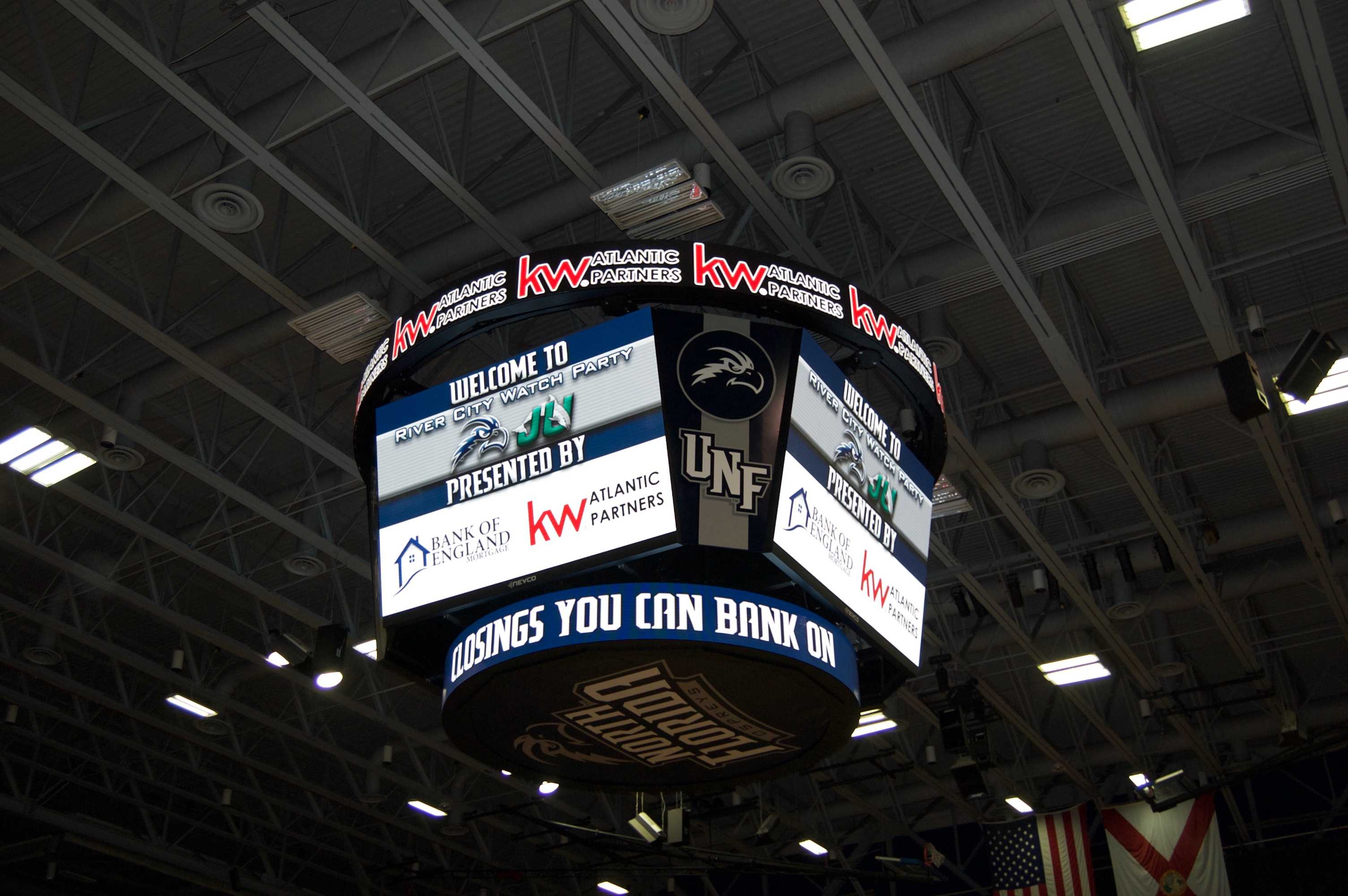 The big screen at the UNF vs. JU watch party held at the UNF Arena.  Photo by Tiffany Salameh