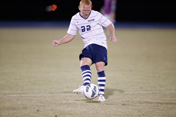 Jay Bolt pushes the ball forward, looking to attack. Photo by Joshua Brangenberg