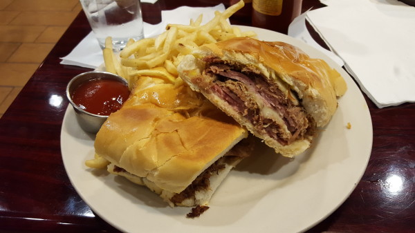  The Cuban Sandwich, with ham, pork, Swiss cheese, mustard and pickles, offers a truer representation of Cuban cuisine than other menu items. Photo by Courtney Stringfellow. 