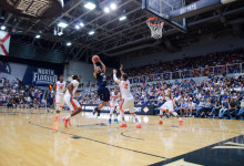 Dallas Moore goes airborne in an attempt at the basket  Photo by Connor Spielmaker 