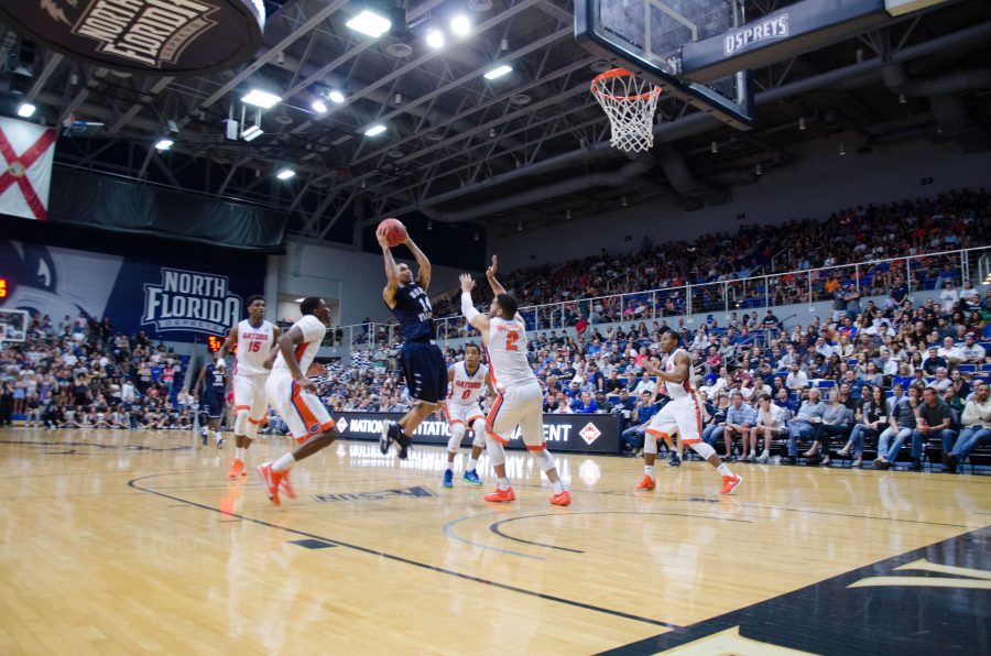 Dallas Moore goes airborne in an attempt at the basket Photo by Connor Spielmaker