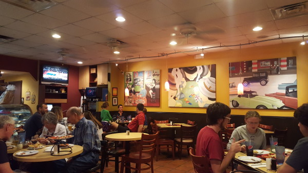 Local families and friends converse with happy expressions and satisfied appetites in every corner of the restaurant. Photo by Courtney Stringfellow. 