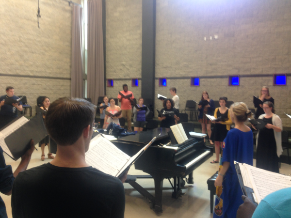 The Chamber singers practice with Dr. Cara Tasher regularly so that they can sound the best that they can. (Photo by Andre Roman)