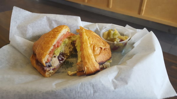 The Chicken Salad Croissant features juicy grapes, crunchy pecans, slices of red onion and chunks of grilled chicken on a soft baked roll. Photo by Courtney Stringfellow.